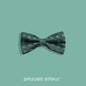Swamp-green silk bow tie with a floral wave pattern