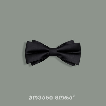 Black silk bow tie featuring the Dark Knight pattern