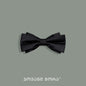 Black silk bow tie featuring the Dark Knight pattern