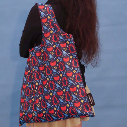 Blue foldable tote bag with the Eye of the Sun print