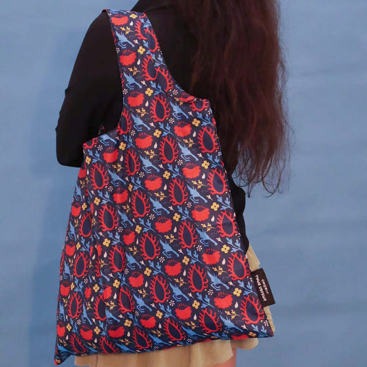Blue foldable tote bag with the Eye of the Sun print