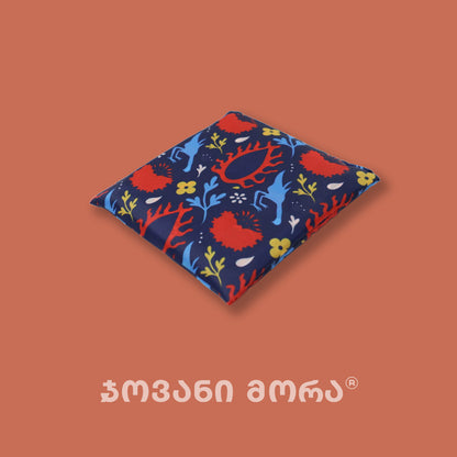 Folded the Eye of the Sun print on a blue tote bag