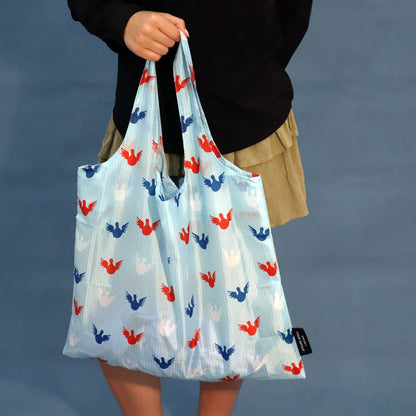 Sky-blue foldable tote bag with the Angels print