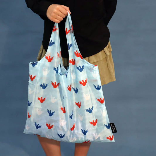 Sky-blue foldable tote bag with the Angels print