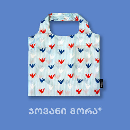 Sky-blue Angels tote bag displayed flat
