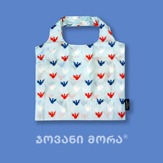 Sky-blue Angels tote bag displayed flat
