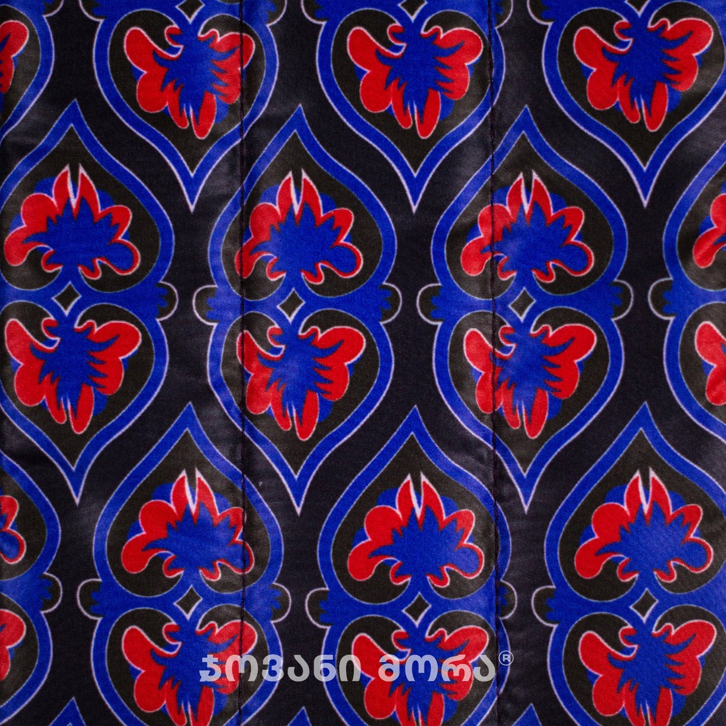 Close-up of Affection Georgian ornament print on padded laptop sleeve