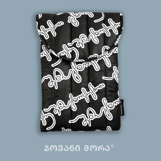 Black polyester laptop sleeve with Live Your Own Life Georgian lettering print by Giovanni Morra