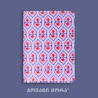 Folded purple Beloved vegan leather passport holder with Georgian textile ornament