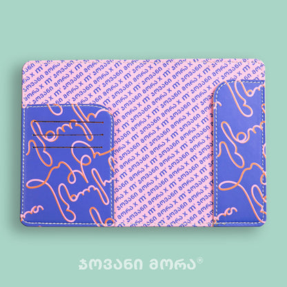 Inside view of purple and pink Live Your Own Life passport holder by Giovanni Morra