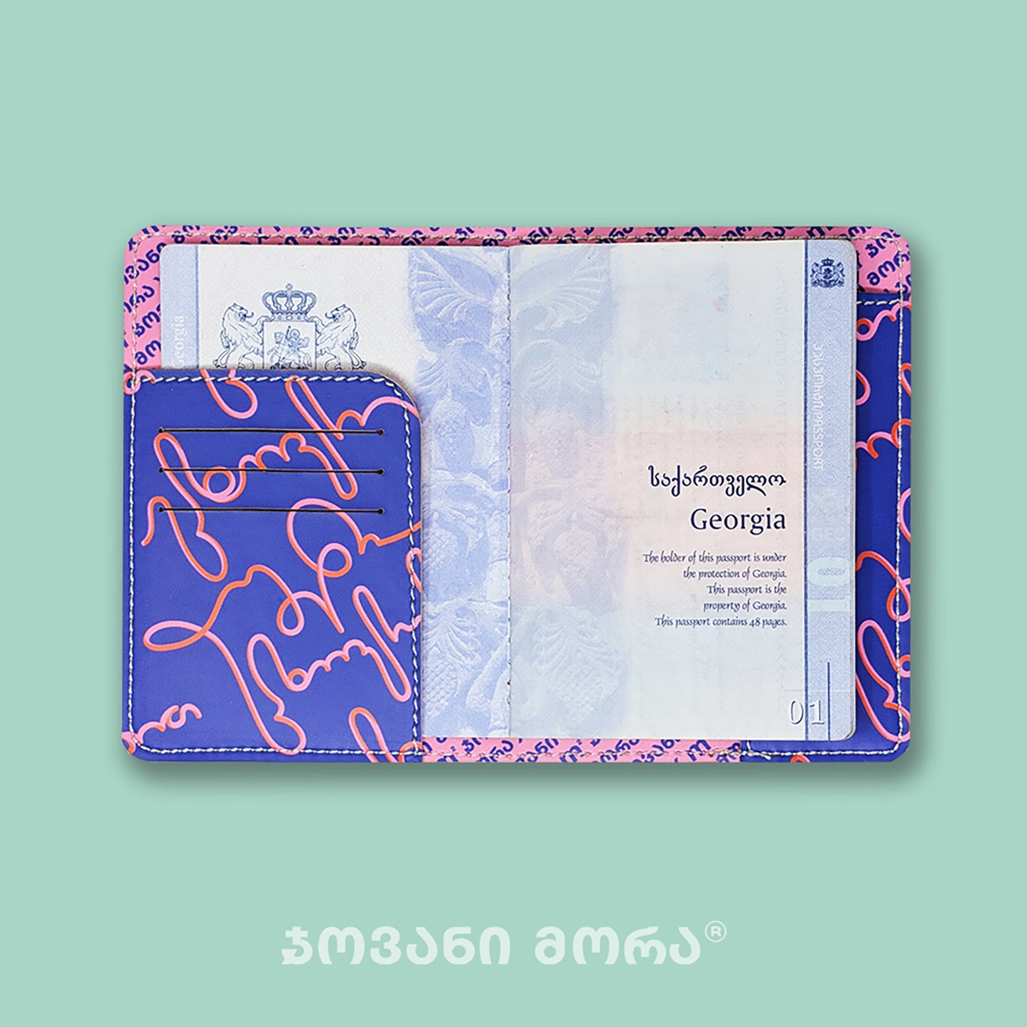 Inside view of purple and pink Live Your Own Life passport holder with Georgian passport