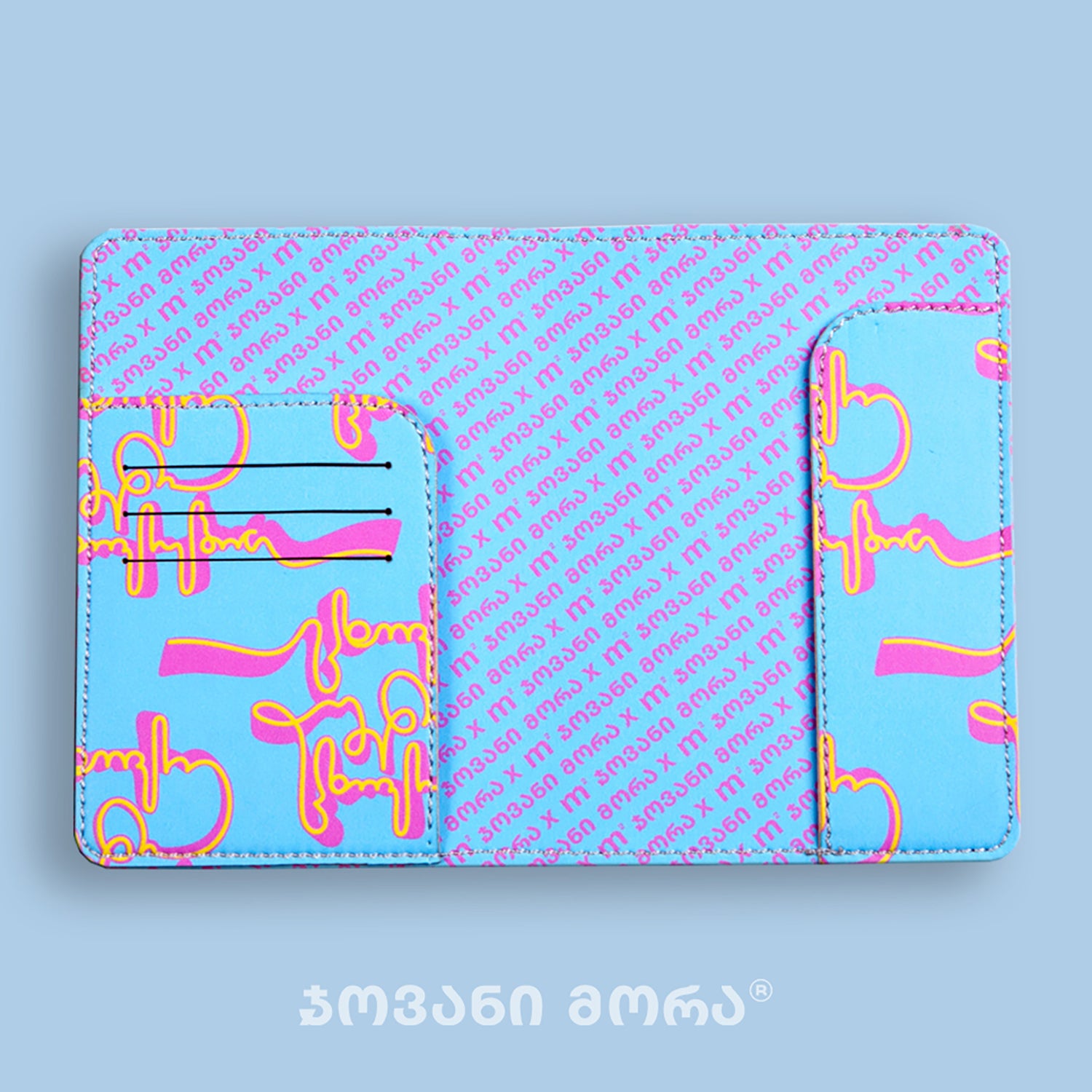 Inside view of sky blue and yellow Live Your Own Life passport holder by Giovanni Morra