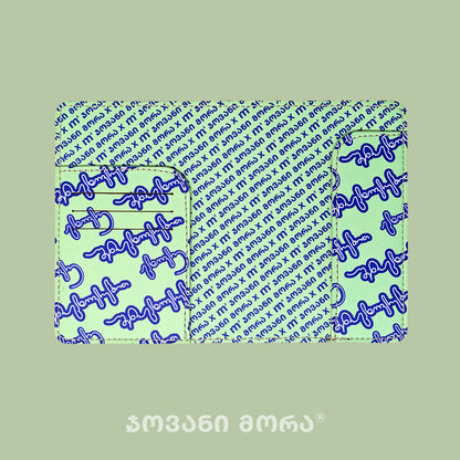 Inside view of lettuce green and purple Live Your Own Life passport holder by Giovanni Morra