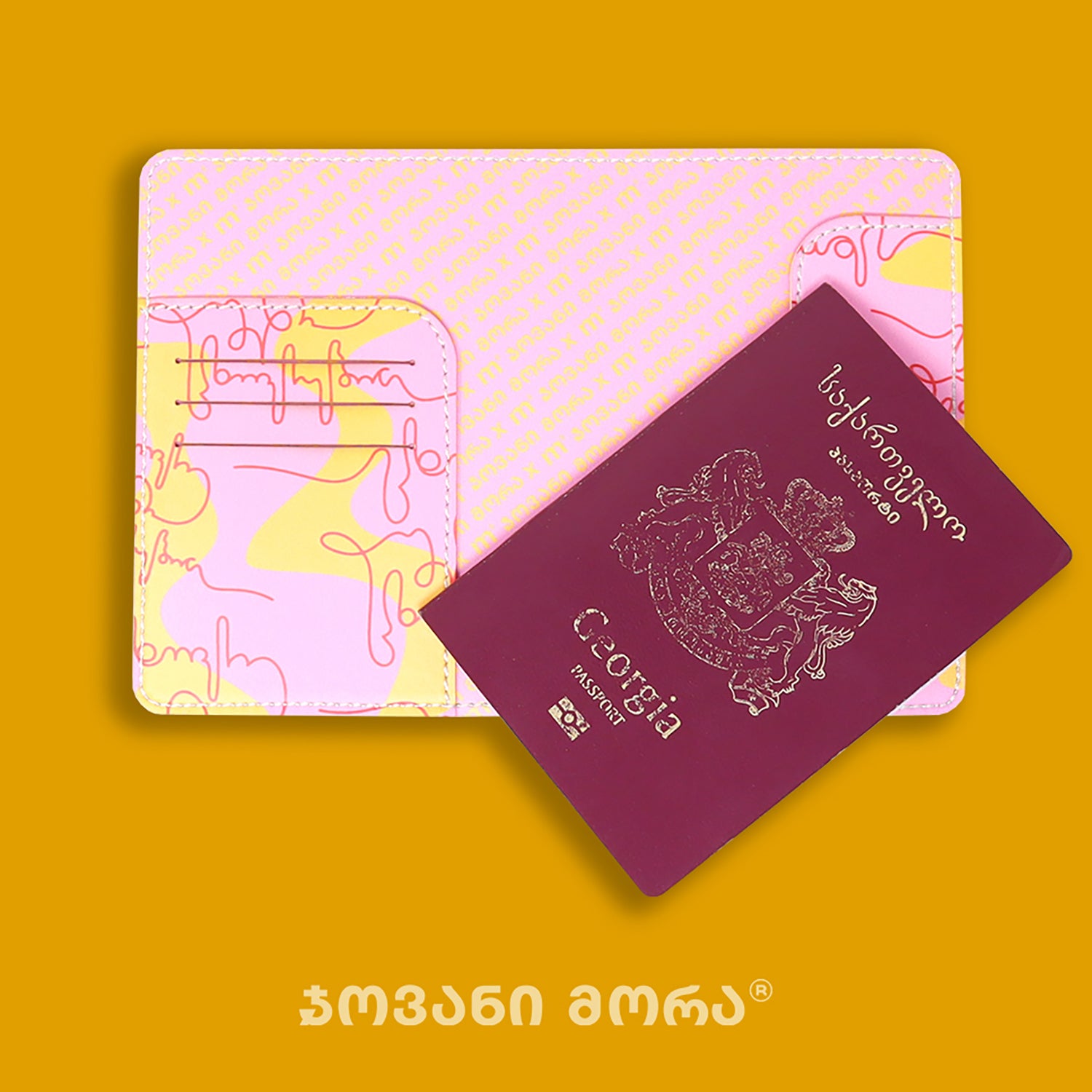 Inside view of Live Your Own Life passport holder with Georgian passport