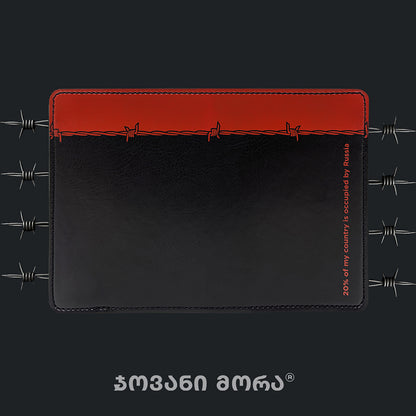 Black and brown vegan leather passport holder with Occupation print by Giovanni Morra