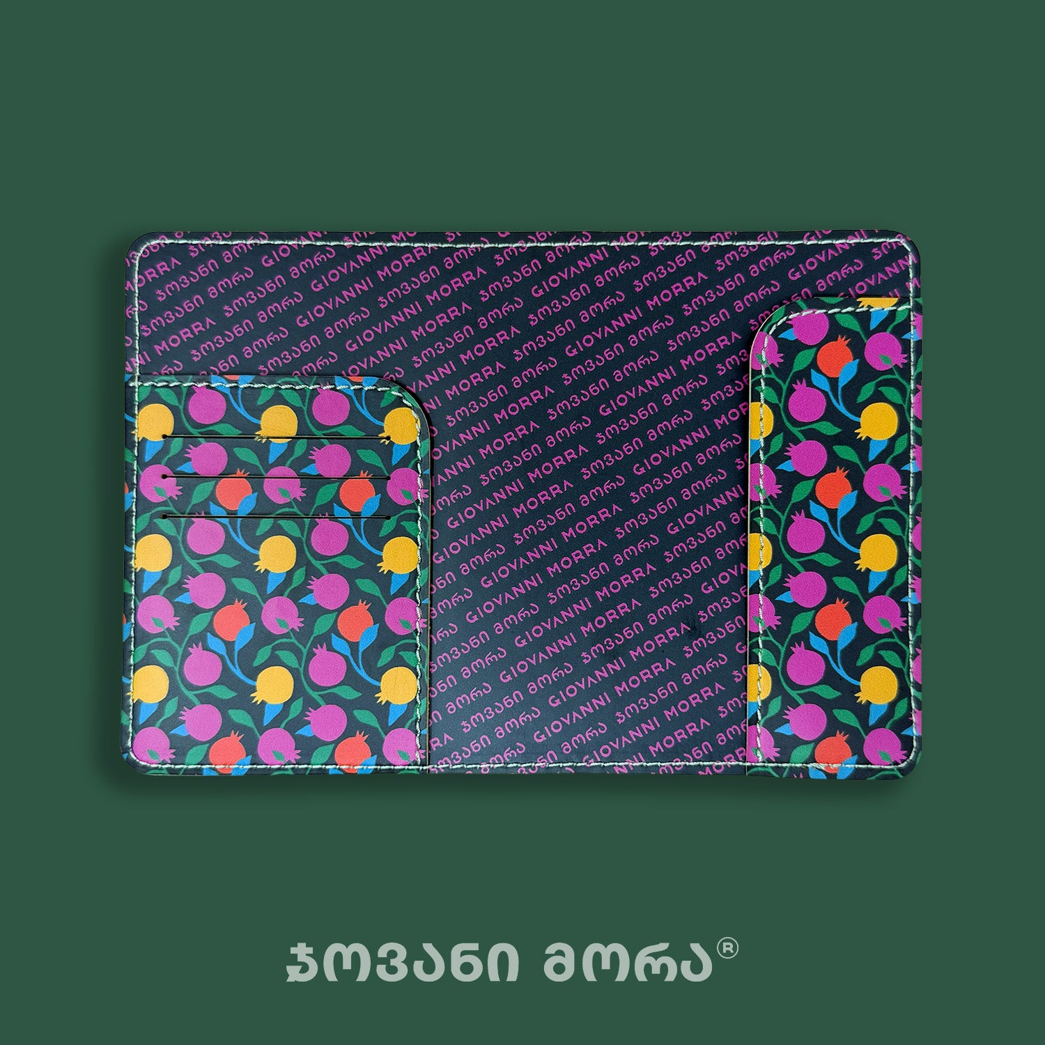 Black Pomegranates passport holder shown open from the inside
