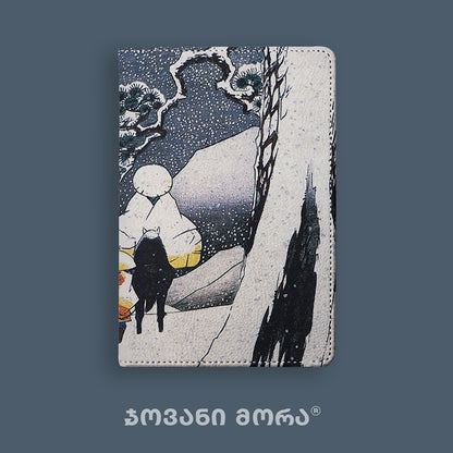 Folded vegan leather passport holder with Travelers illustration by Giovanni Morra