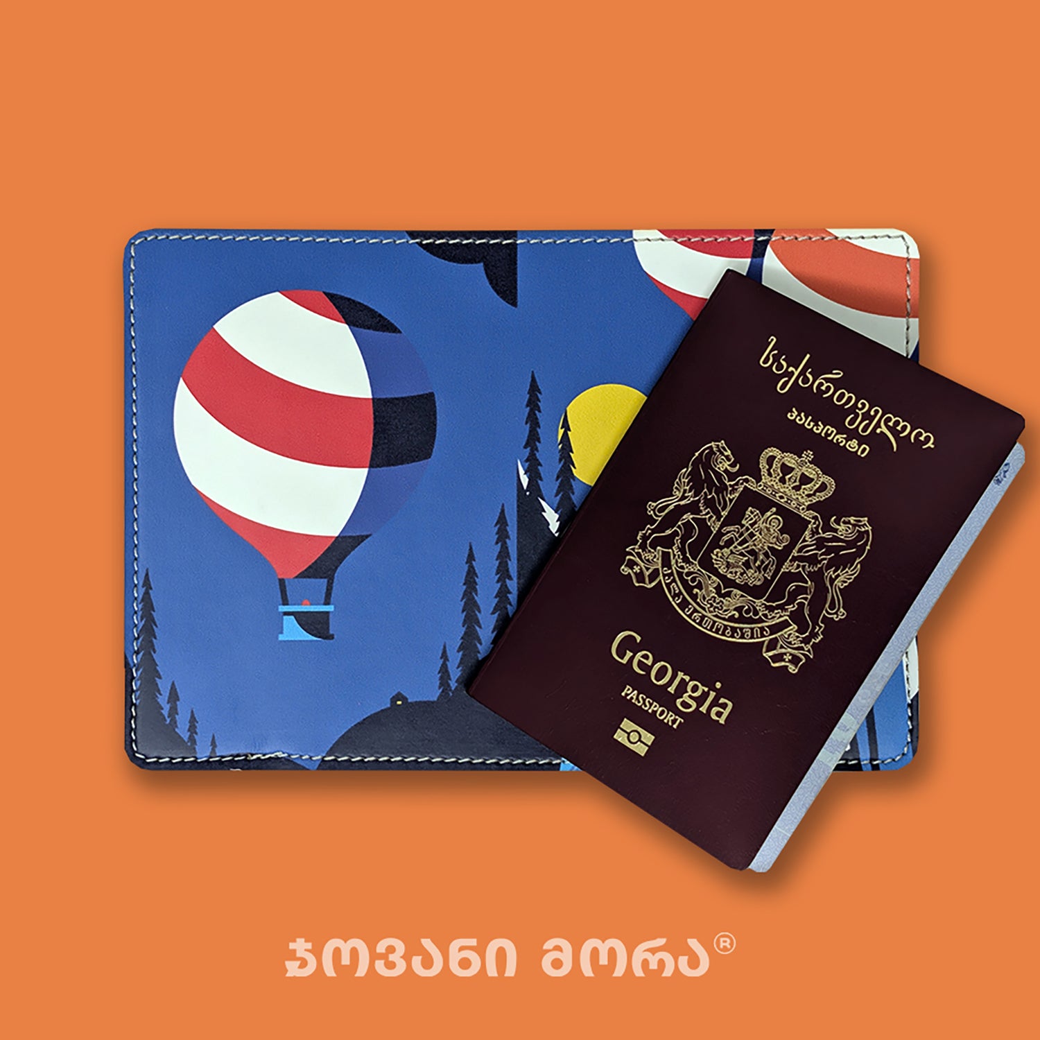 Blue vegan leather passport holder with Skier illustration by Giovanni Morra