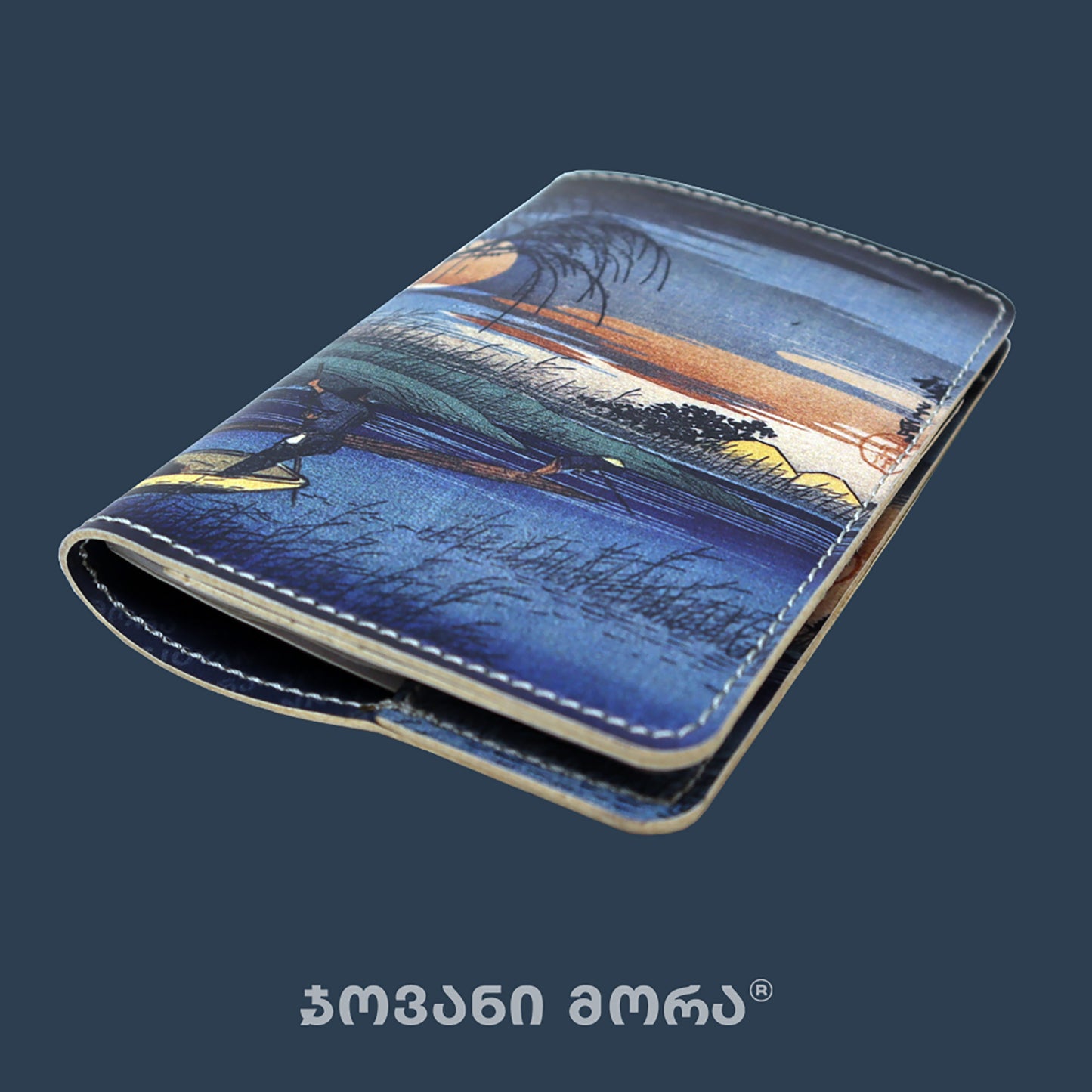 Folded vegan leather passport holder with Japanese Moon illustration by Giovanni Morra