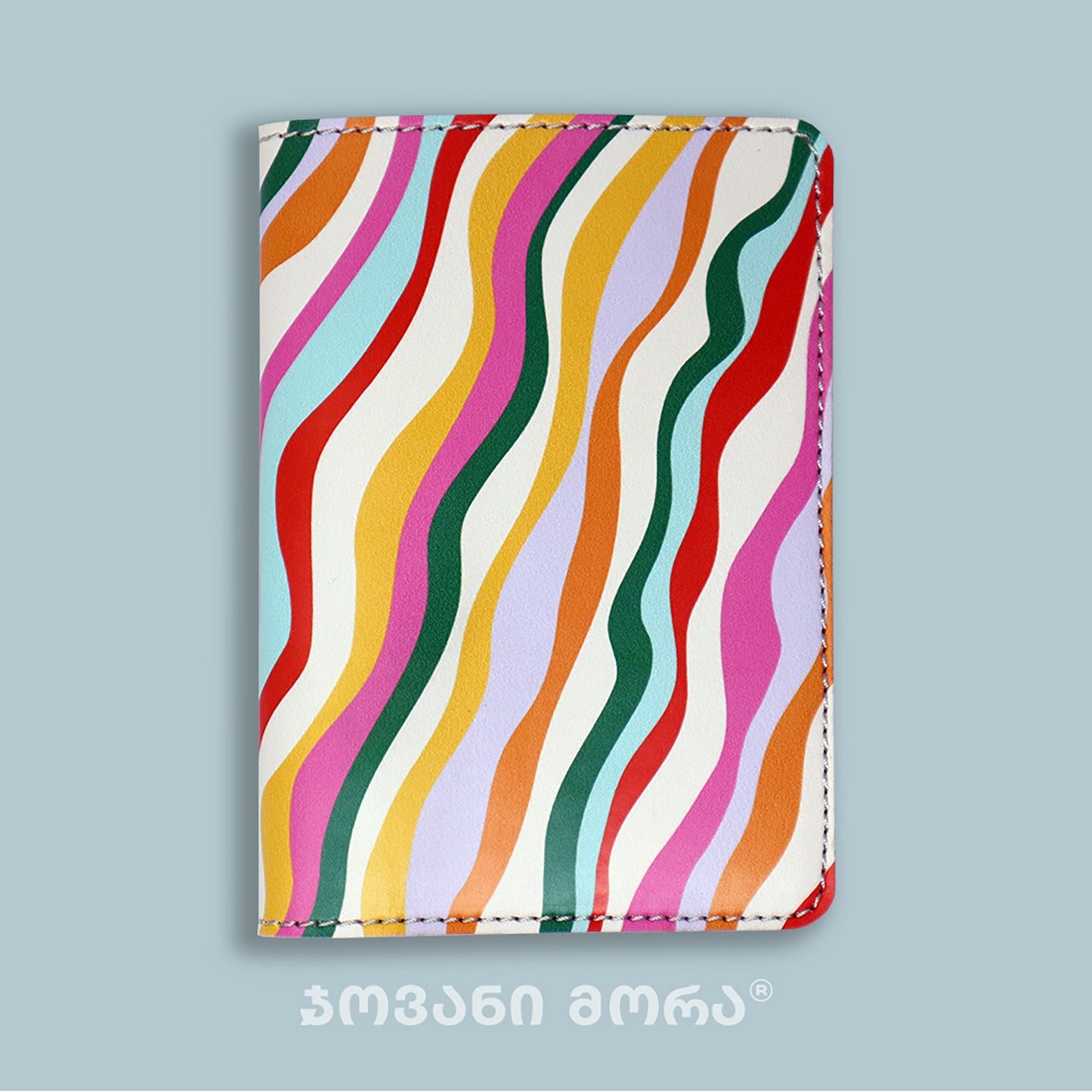 Folded multicolor vegan leather passport holder with Waves print by Giovanni Morra