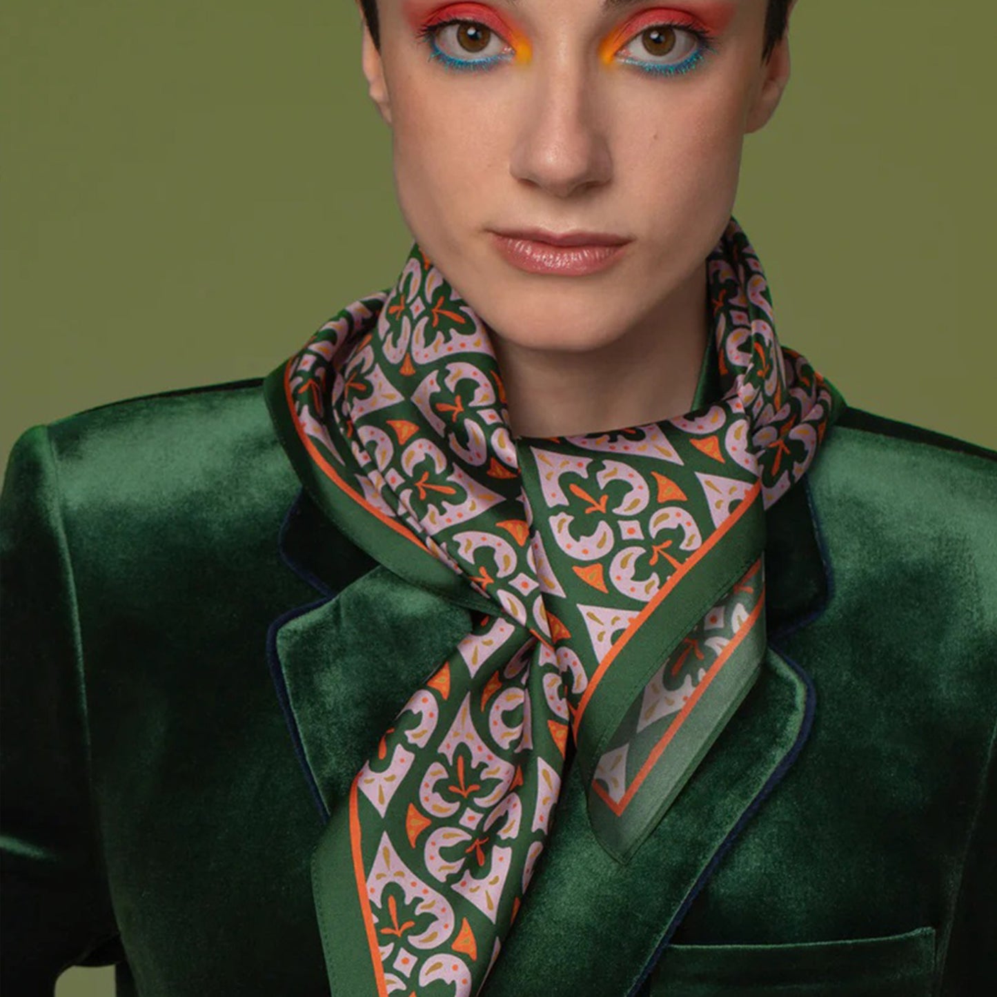 Model wearing the green Affection natural silk scarf by Giovanni Morra