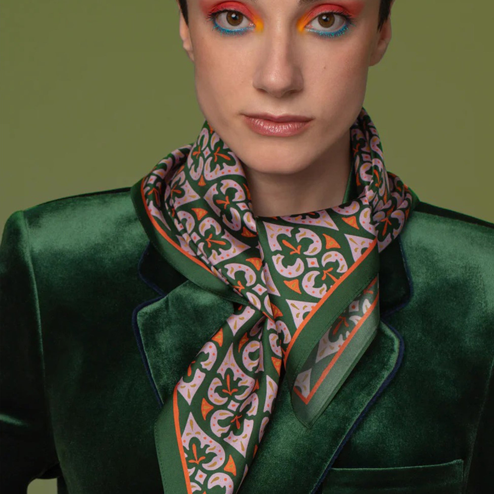Model wearing the green Affection natural silk scarf by Giovanni Morra