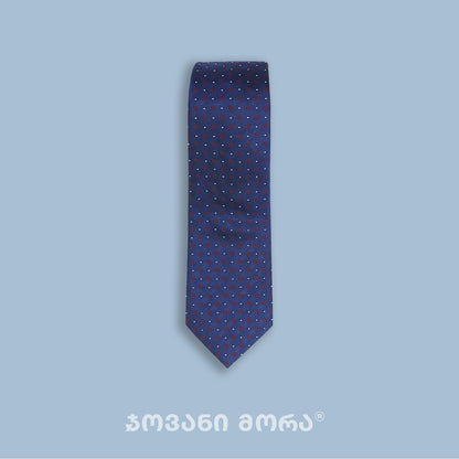 Close-up of dark blue Borjgali jacquard silk tie pattern