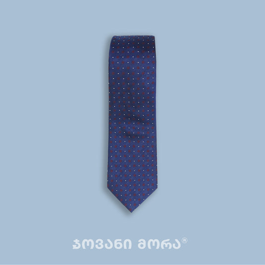 Close-up of dark blue Borjgali jacquard silk tie pattern