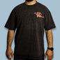 Person wearing a black acid-washed T-shirt with an orange chest graphic