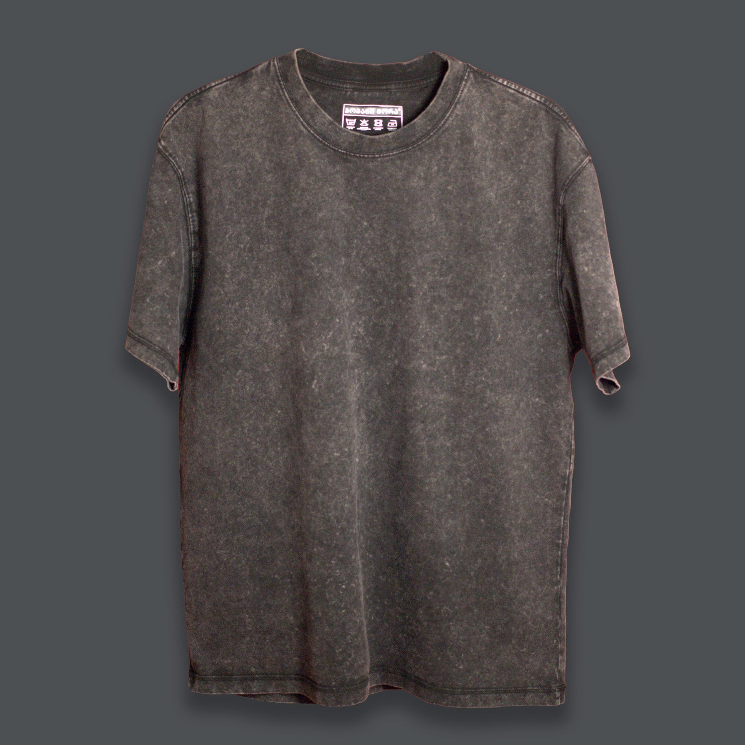 Black acid-washed T-shirt with a tonal Georgian-script logo