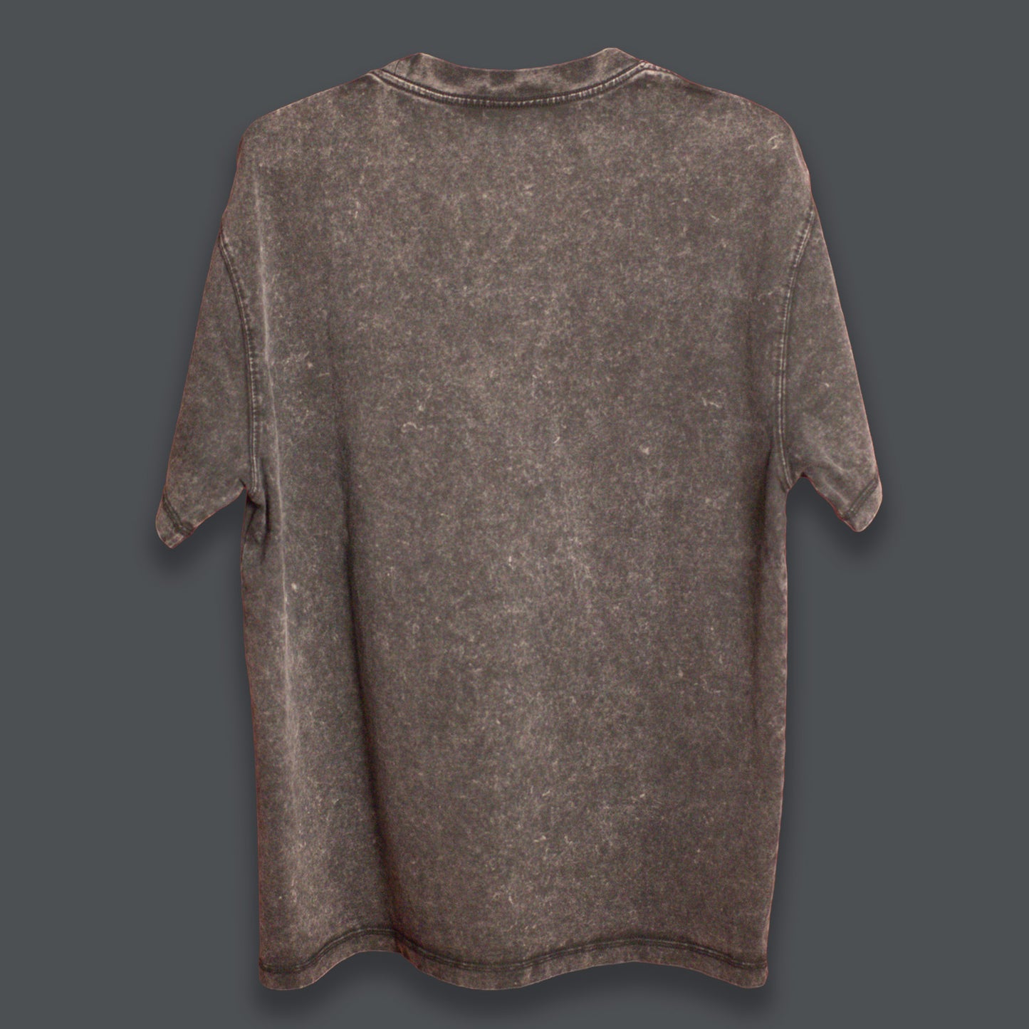 Back view of a black acid-washed oversized T-shirt