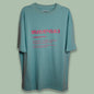 Pale green T-shirt with red Megrelian Tholige text on the front
