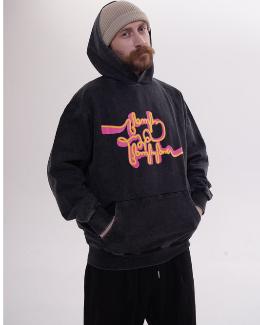 Giovanni Morra x m2 collaboration hoodie featuring the "Live Your Own Life" manifesto in minimalist typography.